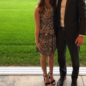 BCBG Max Azria size 0. Clasp at neck. Black & brown/tans. Excellent condition!